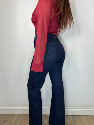 JEANS CON BOTTONI DORATI