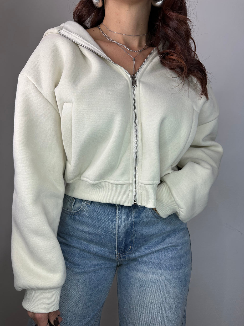 FELPA CON CERNIERE E CAPPUCCIO