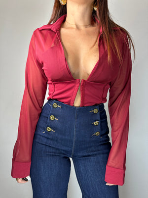 JEANS CON BOTTONI DORATI